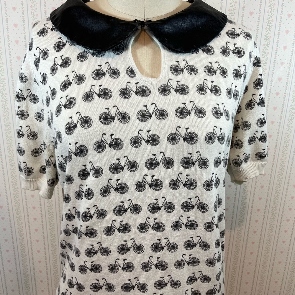 Bicycle knit pattern shirt.